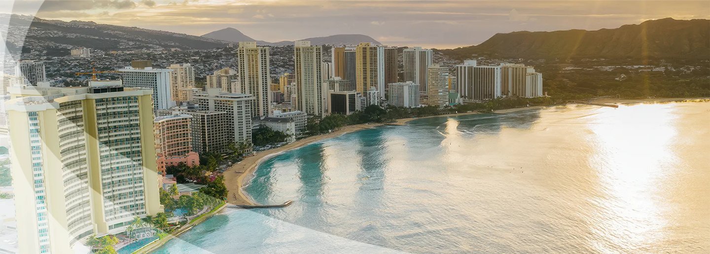 Aerial view of Waikiki Beach and the Honolulu coastline at sunset